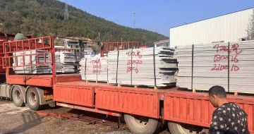 青岛 芝麻灰花岗岩光面毛板出货日常